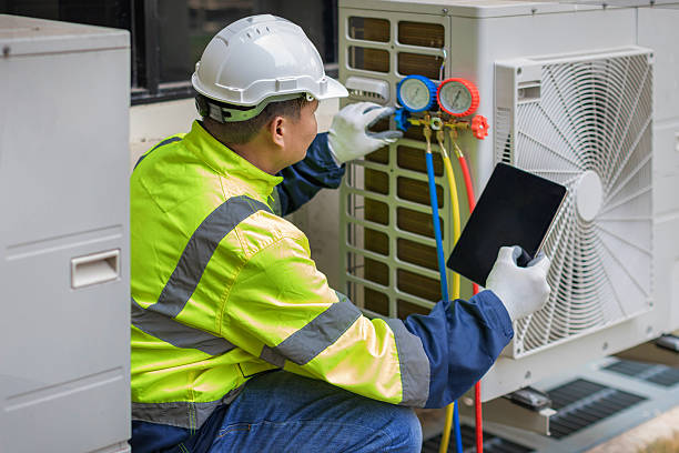 Professional Heat Pump Repair technician working in Pavo, GA